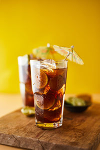 Glass of drink on table