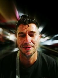 Close-up portrait of man in car