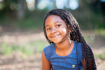 Portrait of smiling girl with long hair