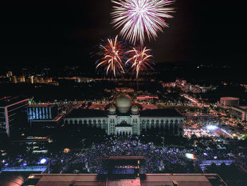 Firework display at night