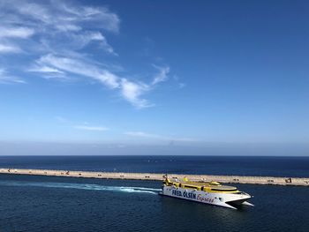 Scenic view of sea against blue sky