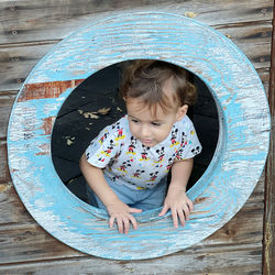 High angle view of cute girl looking away