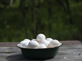 Close-up of eggs in bowl on table