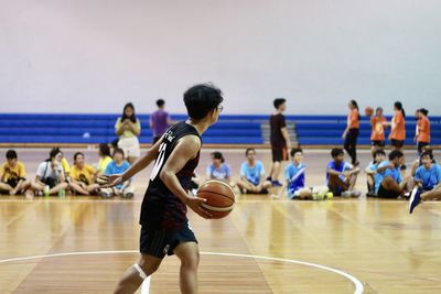 People playing with ball in background