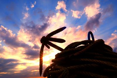 Low angle view of silhouette leaf against sky during sunset