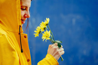 Woman holding flower