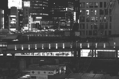 Buildings in city at night