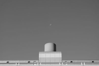 Low angle view of factory against clear sky