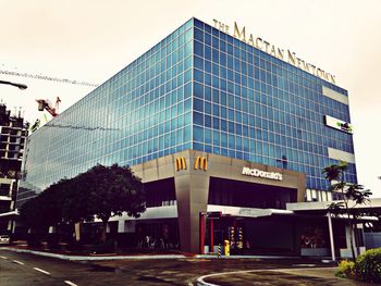 Low angle view of modern building against clear sky