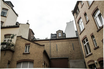 Low angle view of residential buildings against sky