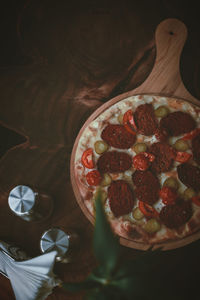 High angle view of pepperoni pizza on table