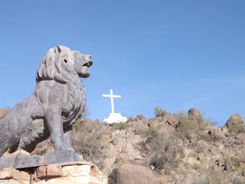 Statue against clear sky