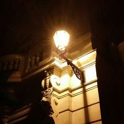 Low angle view of illuminated lamp