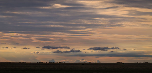 Scenic view of dramatic sky during sunset
