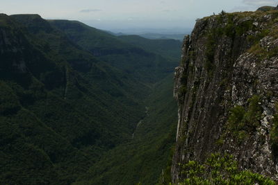 Scenic view of tree mountains against sky