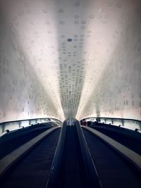 View of escalator through windshield