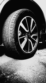 Close-up of tire track on road