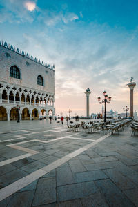 St. mark's square at dawn with trails of people walking