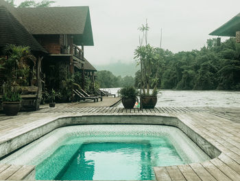 View of swimming pool against buildings