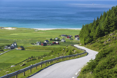 Road on hill by sea