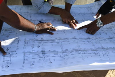 Close-up of man working on table