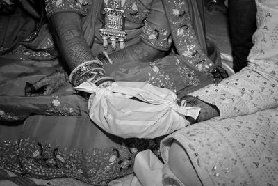 Midsection of woman wearing mask