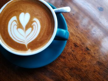 Close-up of cappuccino on table