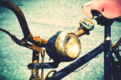 Close-up of person holding bicycle