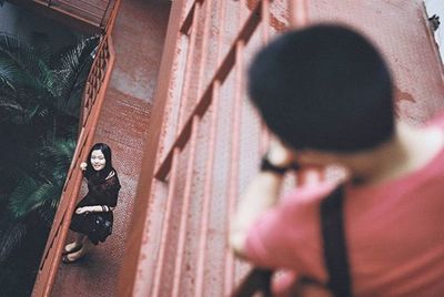 Woman photographing through camera