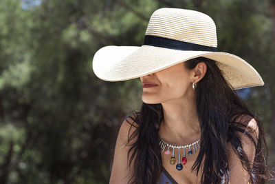 Portrait of woman wearing hat