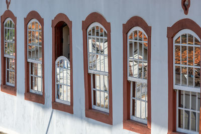 Reflection of building on glass window