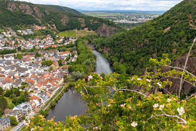 High angle view of river amidst mountains