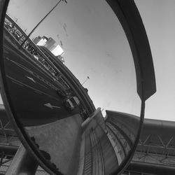 Low angle view of cars against clear sky