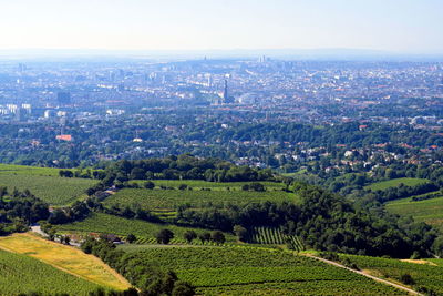 High angle view of trees and buildings against sky