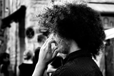 Side view of man with afro hairstyle