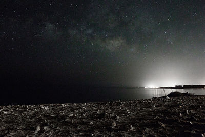 Scenic view of sea against sky at night