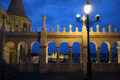 Low angle view of illuminated building at night