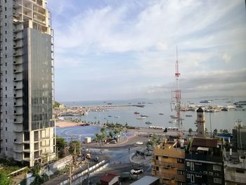 High angle view of buildings against sky in city