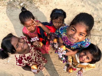 High angle portrait of happy children playing at river side shitilakha, rupganj, bangladesh.