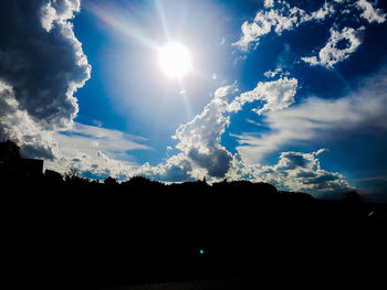 Low angle view of illuminated sky during sunset