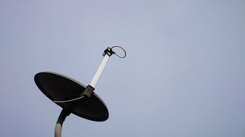 Low angle view of street light against clear sky