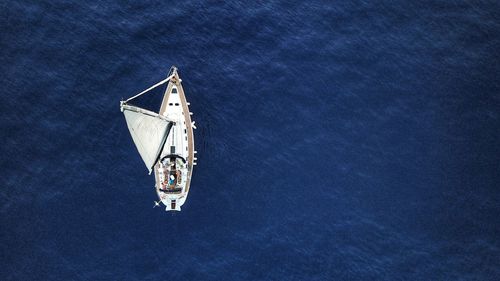 Drone view of ship sailing on sea