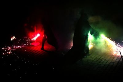 Firework display at night