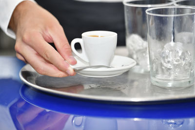 Close-up of coffee cup on table