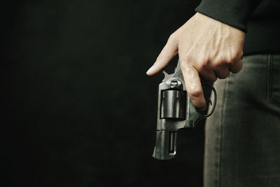 Close-up of hand holding camera