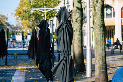 Clothes drying hanging on street in city