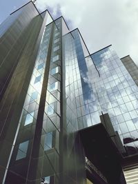 Low angle view of skyscrapers against sky