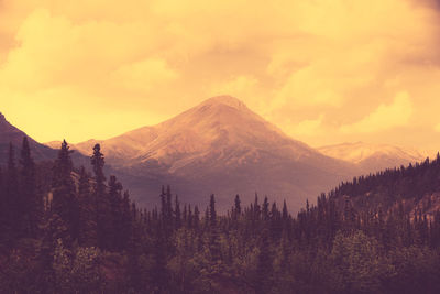 Scenic view of mountains against sky during sunset