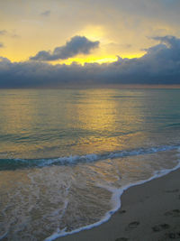 View of calm sea at sunset