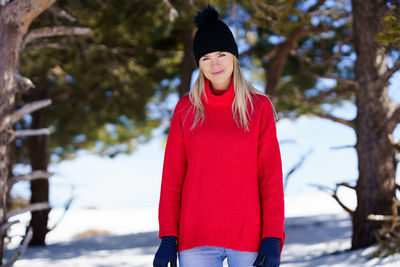 Woman standing in park during winter